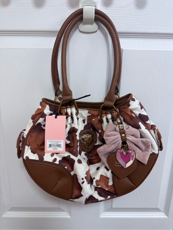 Juicy Couture Handbags - NWT Juicy Romance Cow Print Satchel in Saddle (Brown)